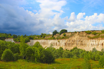 Fototapeta premium Cretaceous quarry. Landscape with sandy cliffs and beautiful sky