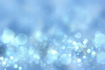 Abstract blurred festive blue background  for Christmas with bokeh defocused blue lights.