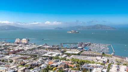 San Francisco in California, the Alcatraz island in the beautiful bay, and the Pier 39 with the marina 
