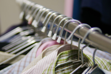 Men shirts on clothes rack