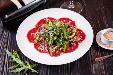 carpaccio with arugula