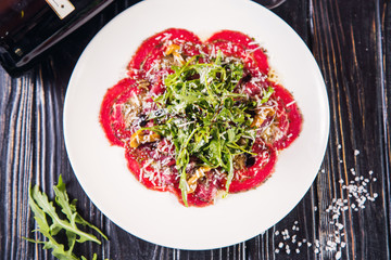 carpaccio with arugula