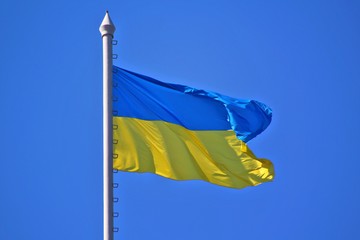 Flag of Ukraine: horizontally divided blue-yellow stripes.