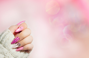 Colorful  Nail art . Manicure.  Holiday style bright Manicure with gems and sparkles. Nail Polish....