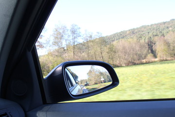 Car and rear view mirror