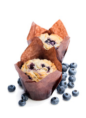 Delicious  blueberry muffins isolated on white