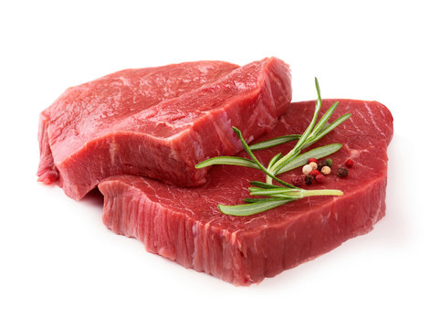 Raw meat with rosemary and pepper