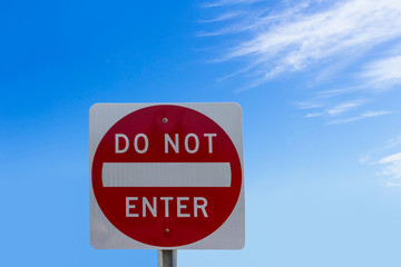 Do not enter sign on blue sky background with clipping path