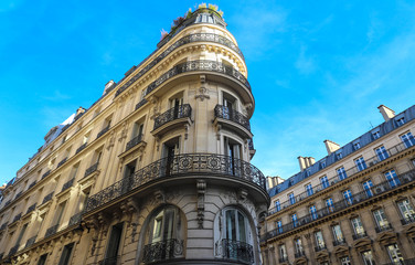 Naklejka premium The traditional facades of Parisian buildings, France.