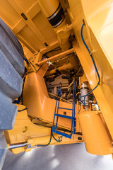 Engine compartment in a giant yellow dump truck