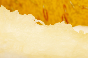 One yellow honeydew melon slice without seeds