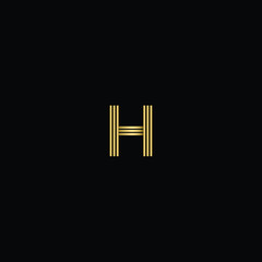 Modern Minimal Geometric and Linear Letter H Logo Design in Black and Gold Color