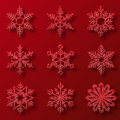 Collection of red glitter snowflakes. Nine snowflakes of different shapes. Winter holidays decoration