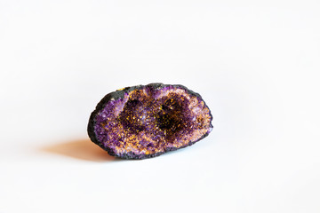 Purple amethyst crystal quartz with pyrite inside isolated on white background