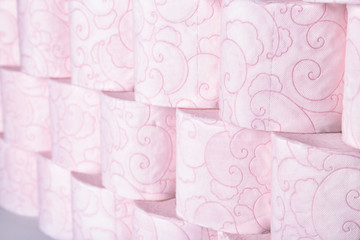 Many rolls of toilet paper as background. Personal hygiene