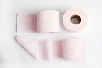Toilet paper rolls on white background, top view