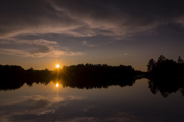 Obraz premium Sunset on Spider Lake in Northern Wisconsin.