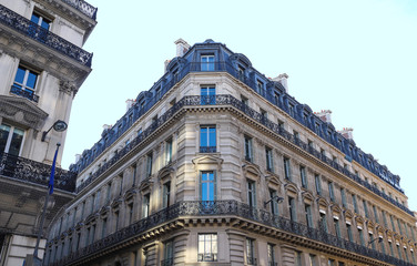 Fototapeta na wymiar The traditional facades of Parisian buildings, France.