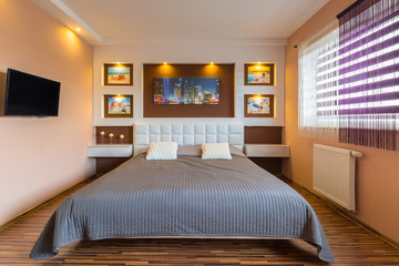 Brown and beige master bedroom interior