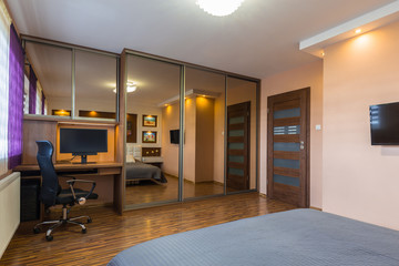 Brown and beige master bedroom interior