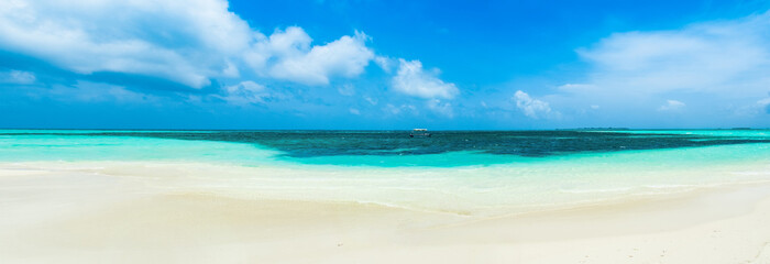Beautiful landscape of clear turquoise Indian ocean, Maldives islands