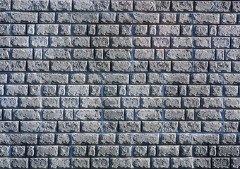 Texture of the brick wall under the cement close-up