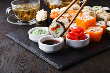 Japanese sushi set with green tea ready to serve