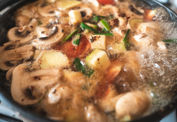 Soup is brewed in a saucepan