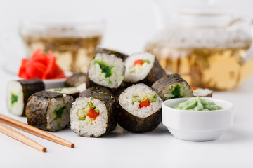 Japanese sushi set with green tea ready to serve