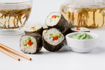 Japanese sushi set with green tea ready to serve