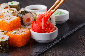 Delicious Peace of Sushi Rolls in Stick. Fresh Food Portion