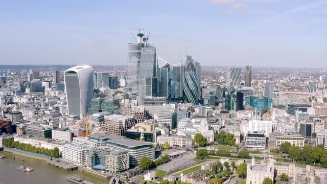 Modern Office Towers Aerial View in Business and Financial District in London. Most Advanced Construction Techniques and Architecture can be seen in New Skyline of England's Capital, UK - 4K HD