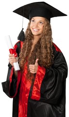 Friendly Young Girl in Graduation Gown with Thumb Up Holding a
