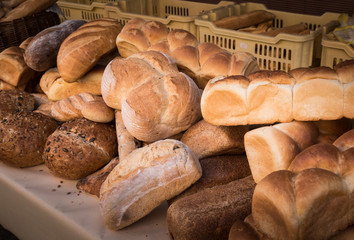 Assortment of bread in the shop.  Different fresh bread on market.