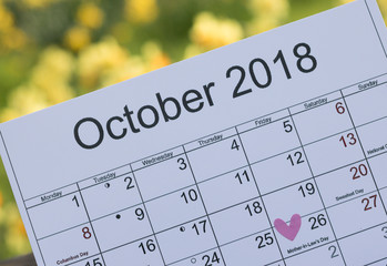 Close-up: Image of calendar of October 2018 with marked a date of Mother-in-law's Day. 