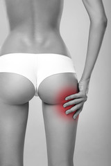 Health issues - young female suffering from joint or muscle pain