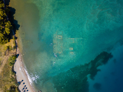 Aerial drone bird's eye view photo of old Sunken City of Epidauros, Greece