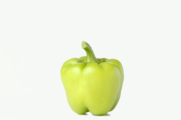 Green pepper on white background. Colorful paprika isolated.