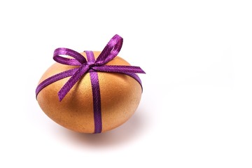 Golden Egg Wrapped Around With Ribbon