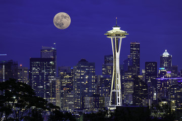 Full moon rising over the city of Seattle