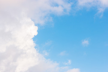 Fototapeta premium The vast blue sky with large group of fluffy clouds in sunny day of summer, peaceful skies background