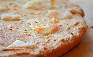 Flat bread with bacon and caraway seeds