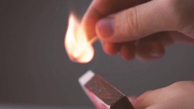 One quiet burning match. Match burning details