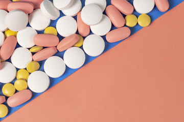 background of two colors and pills