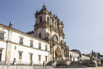 Fototapeta na wymiar Details of the exterior front of the Alcobaca Monastery, or Mosteiro de Santa Maria de Alcobaca, in Portugal. No people.