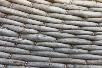 Old wicker basket background and the texture of the branches