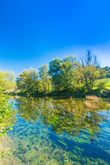 Fototapeta na wymiar Croatia, countryside landscape, river Dobra in Novigrad, Karlovac county 
