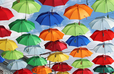 Fototapeta na wymiar colorful umbrellas create a mood