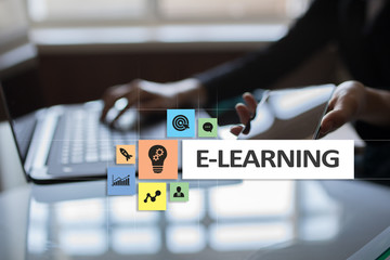 E-Learning on the virtual screen. Internet education concept.