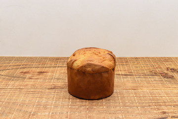 panettone cut with rustic wooden board